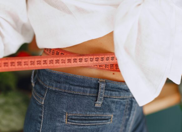 Maßband um Taille
