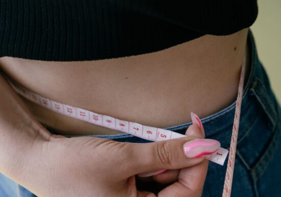 Maßband um Taille