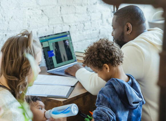 Family with man at desk