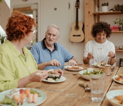 Group of people eating healthy dinner