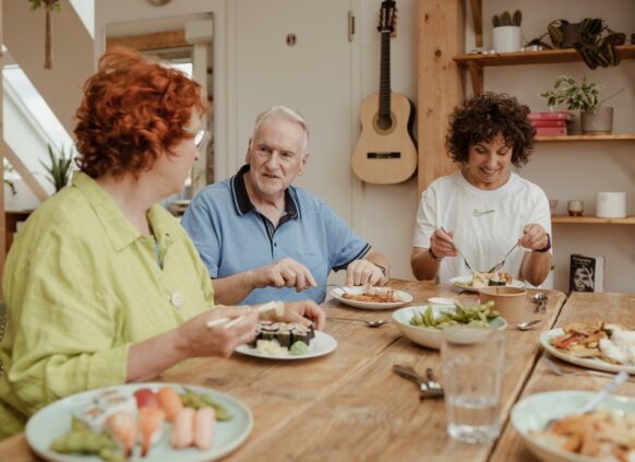 Group of people eating healthy dinner