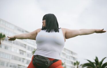 Higher weight woman stretching
