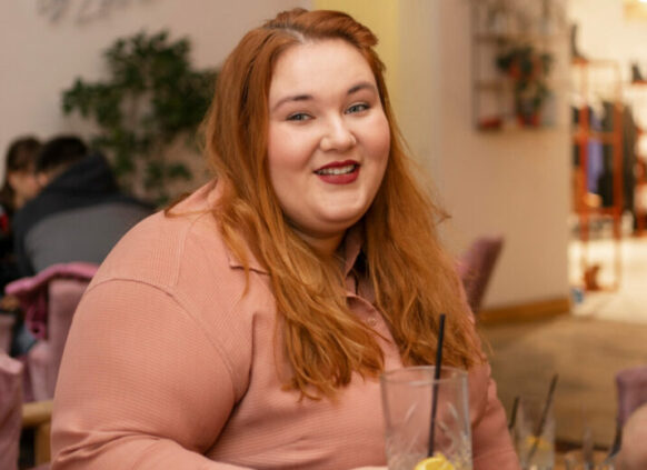 Woman with overweight smiling