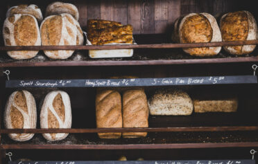 Loaves of bread on bakery shelves