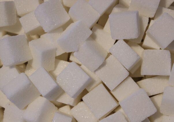 Close-up of white sugar cubes stacked together.