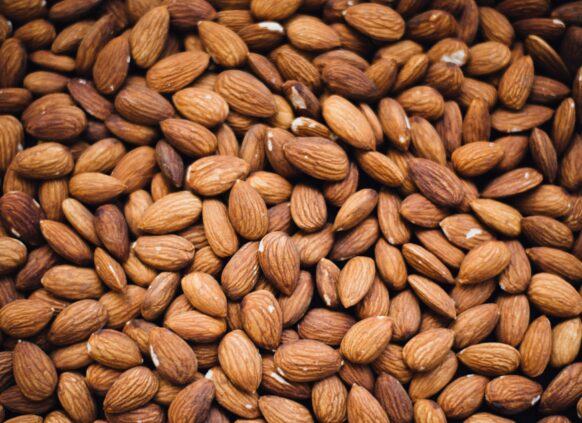 Close-up of raw almonds filling the frame