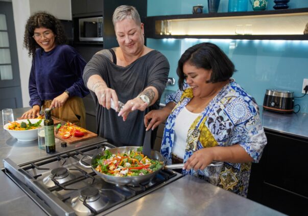 Two women cooking together